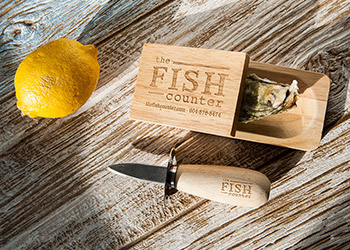 Image of oyster knife and shucking block